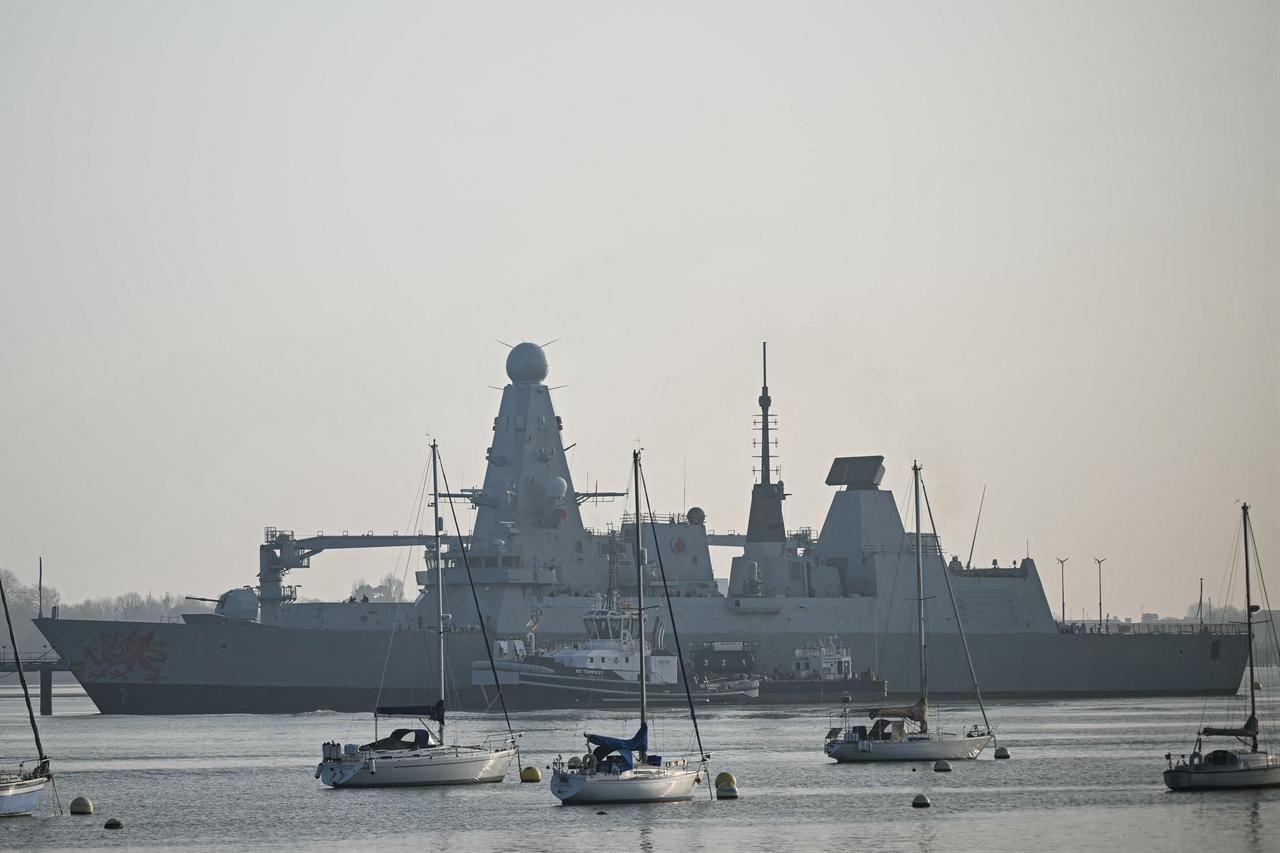 HMS Dragon, a Type 45 Daring-class air-defence destroyer warship, is pictured moored at the HMNB Portsmouth Upper Harbour Ammunition Facility (UHFC), outside HM Naval Base Portsmouth, on the south coast of England, March 4, 2026. (AFP Photo)