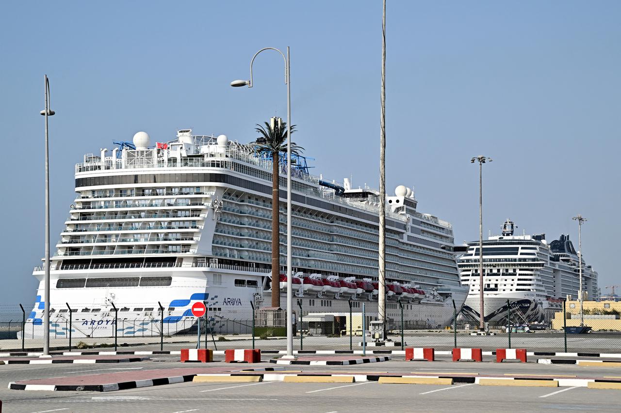 (L to R) The Malta-flagged cruise ships Aroya Manara and MSC Euribia are anchored at the port of Dubai, March 4, 2026. (AFP Photo)