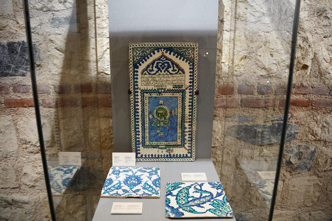 Historic Iznik tiles, including examples returned to Türkiye after being taken abroad illegally, are displayed at the sacred relics exhibition in Istanbul, Türkiye, March 4, 2026. (AA Photo)