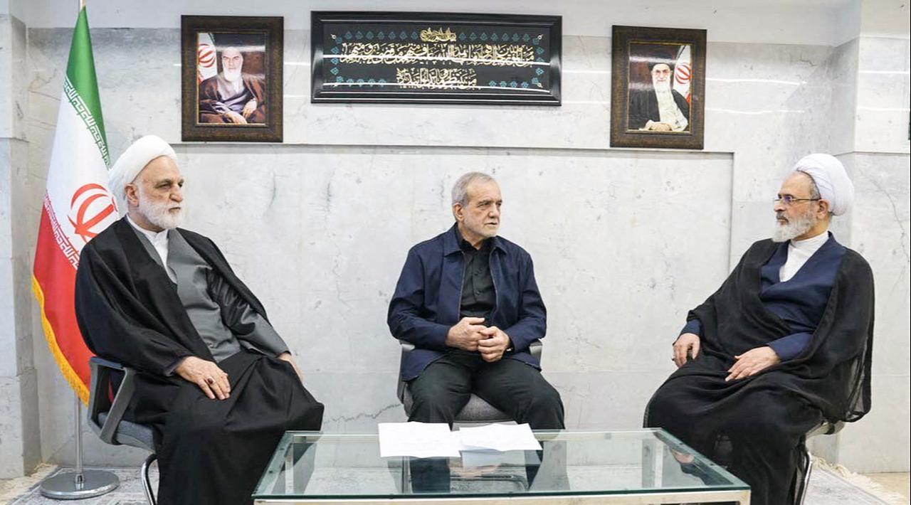 The second meeting of the Interim Leadership Council attended by President Masoud Pezhakian (C) Judiciary Chief Gholamhossein Mohseni Ejei (L) and Alireza Aarafi (R), a member of the Guardian Council's jurist, in Tehran, March 2, 2026. (Photo by Handout/IRIBNEWS/AFP)