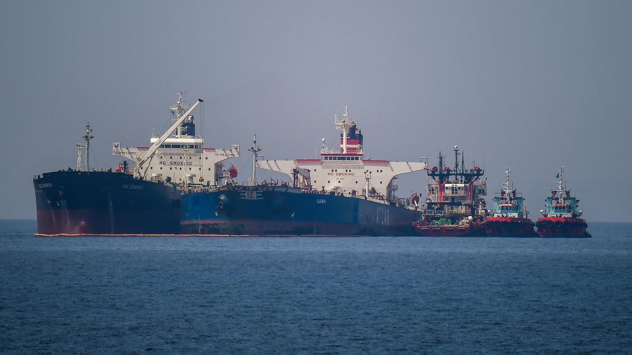 The Liberian-flagged oil tanker Ice Energy (L) transfers crude oil from the Russian-flagged oil tanker Lana (R) (former Pegas), off the shore of Karystos, on the Island of Evia, May 29, 2022. (AFP Photo)