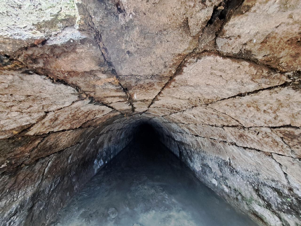 A vaulted underground water tunnel believed to date to the Roman period emerges during urban redevelopment works in Trabzon, Türkiye, March 4, 2026. (IHA Photo)