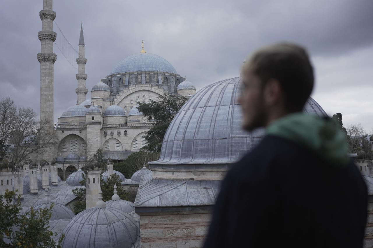 Adria Calafell looks at the Suleymaniye mosque, where he converted to Islam in Istanbul, Türkiye, on February 27, 2026. (AA Photo)
