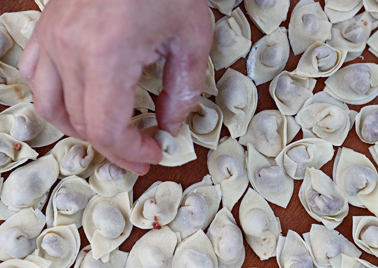 Small dumplings filled with minced meat are shaped by hand during the preparation of traditional Sinop mantisi in Sinop, Türkiye, March 6, 2026. (AA Photo)
