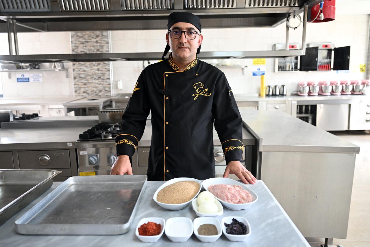 Chef Aksoy highlights the importance of basil and spices in Yozgat’s traditional gilik. Türkiye, March 7, 2026. (AA Photo)