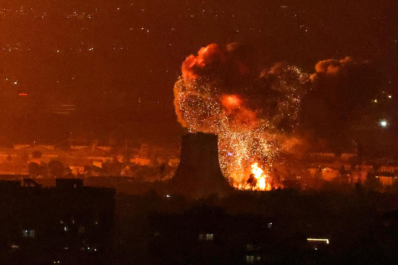 An explosion erupts following strikes near Azadi Tower close to Mehrabad International Airport in Tehran, Iran on March 7, 2026. (AFP Photo)