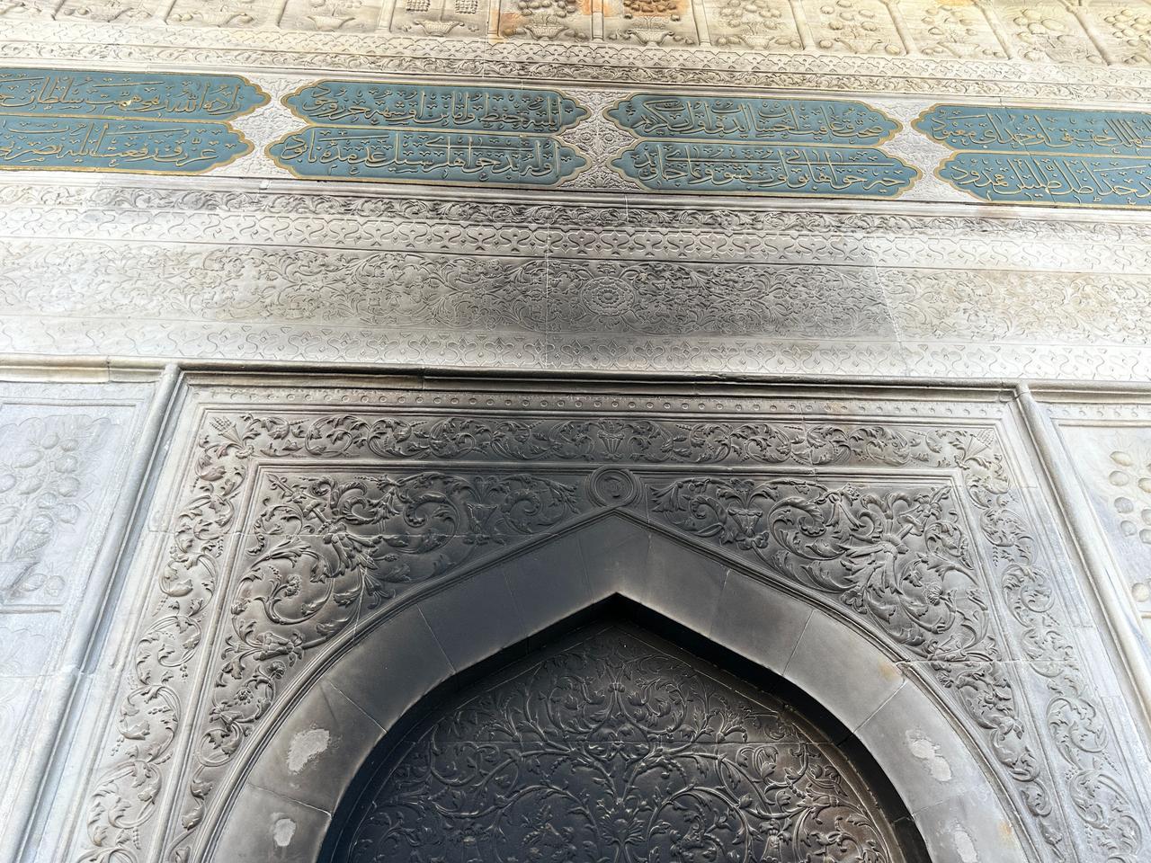 Details of the ornate marble carvings of the Tophane Fountain are partially darkened by soot following a fire lit near the structure in Istanbul, Türkiye, March 8, 2026. (AA Photo)