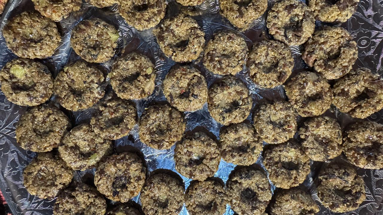 Freshly shaped ciger taplamasi patties are arranged on a tray before cooking in Bitlis, Türkiye, March 9, 2026. (AA Photo)