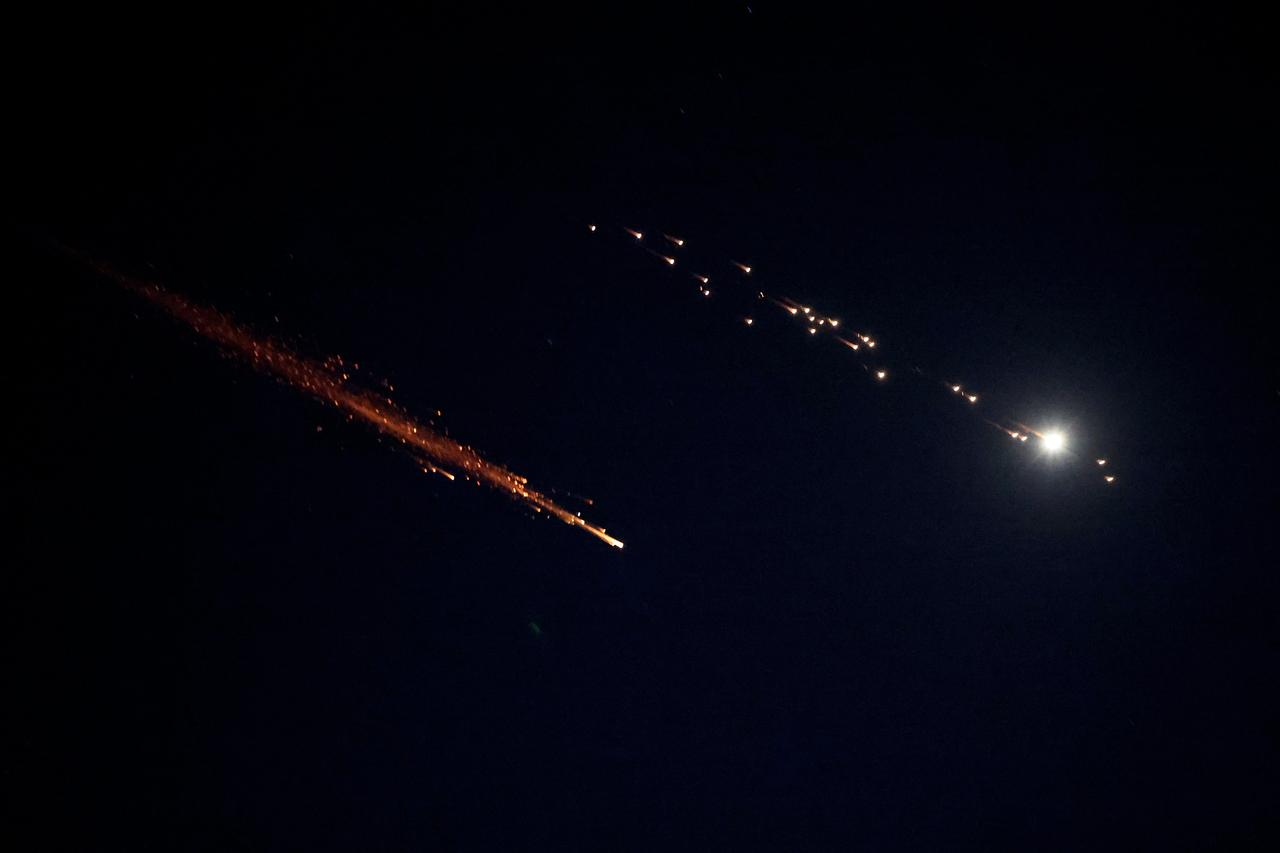 Rocket trails are seen in the sky above the Israeli center coastal city of Netanya amid a fresh barrage of Iranian missile attacks on March 9, 2026. (AFP Photo)