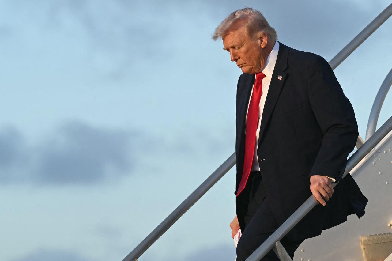 US President Donald Trump disembarks from Air Force One upon arrival at Miami International Airport in Miami, Florida, on March 7, 2026. (AFP Photo)