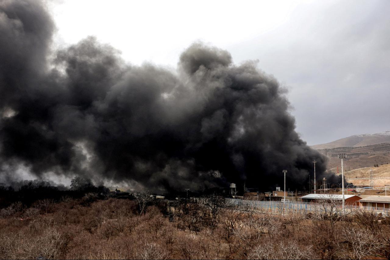A smoke plume rises from an ongoing fire following an overnight airstrike on the Shahran oil refinery in northwestern Tehran on March 8, 2026. (AFP Photo)