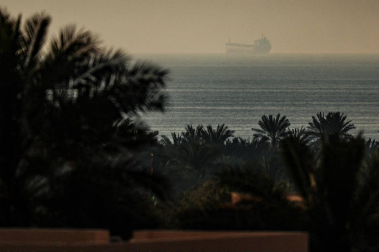 A tanker passes through the Strait of Hormuz, photo accessed on March 24, 2026. (AFP Photo)