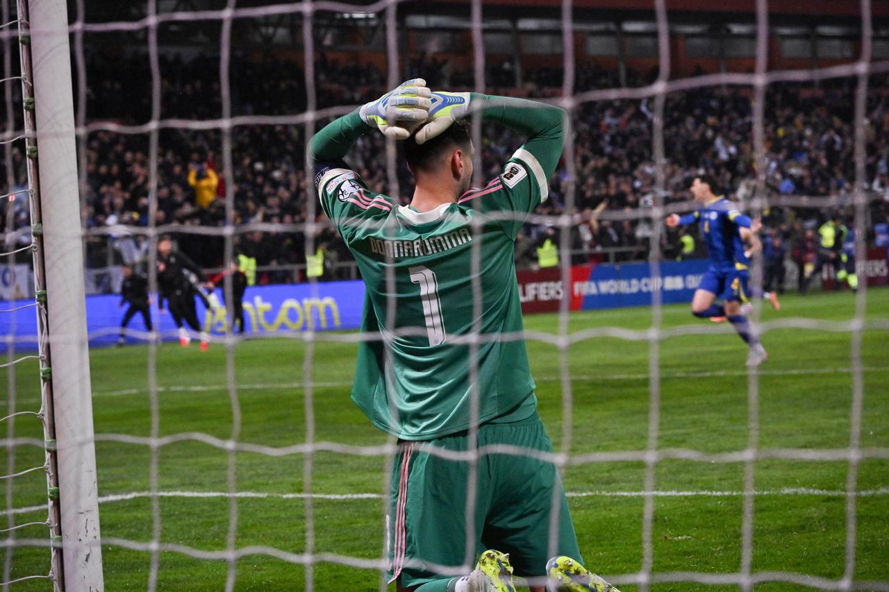 Italy goalkeeper #01 Gianluigi Donnarumma reacts after his team’s defeat in the 2026 FIFA World Cup European qualification play-off final against Bosnia and Herzegovina at Bilino Polje Stadium in Zenica, March 31, 2026. (AFP Photo)