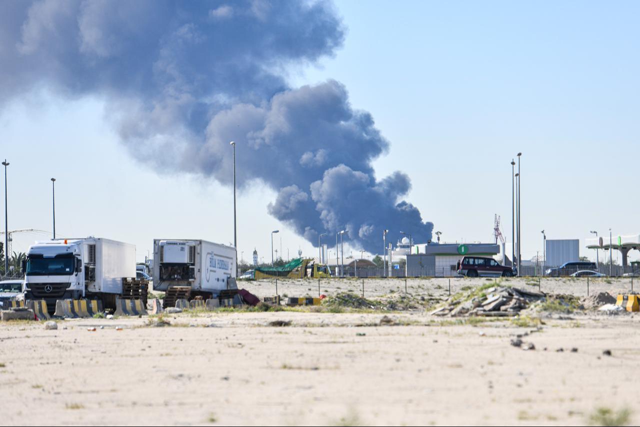Smoke rises after an Iranian drone attack struck fuel tanks at Kuwait International Airport in Kuwait City, Kuwait, on April 1, 2026. (AA Photo)