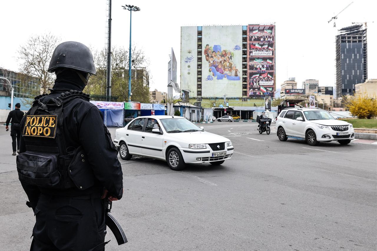 A member of the Iranian security forces stands guard in Tehran, Iran on March 31, 2026. (AFP Photo)