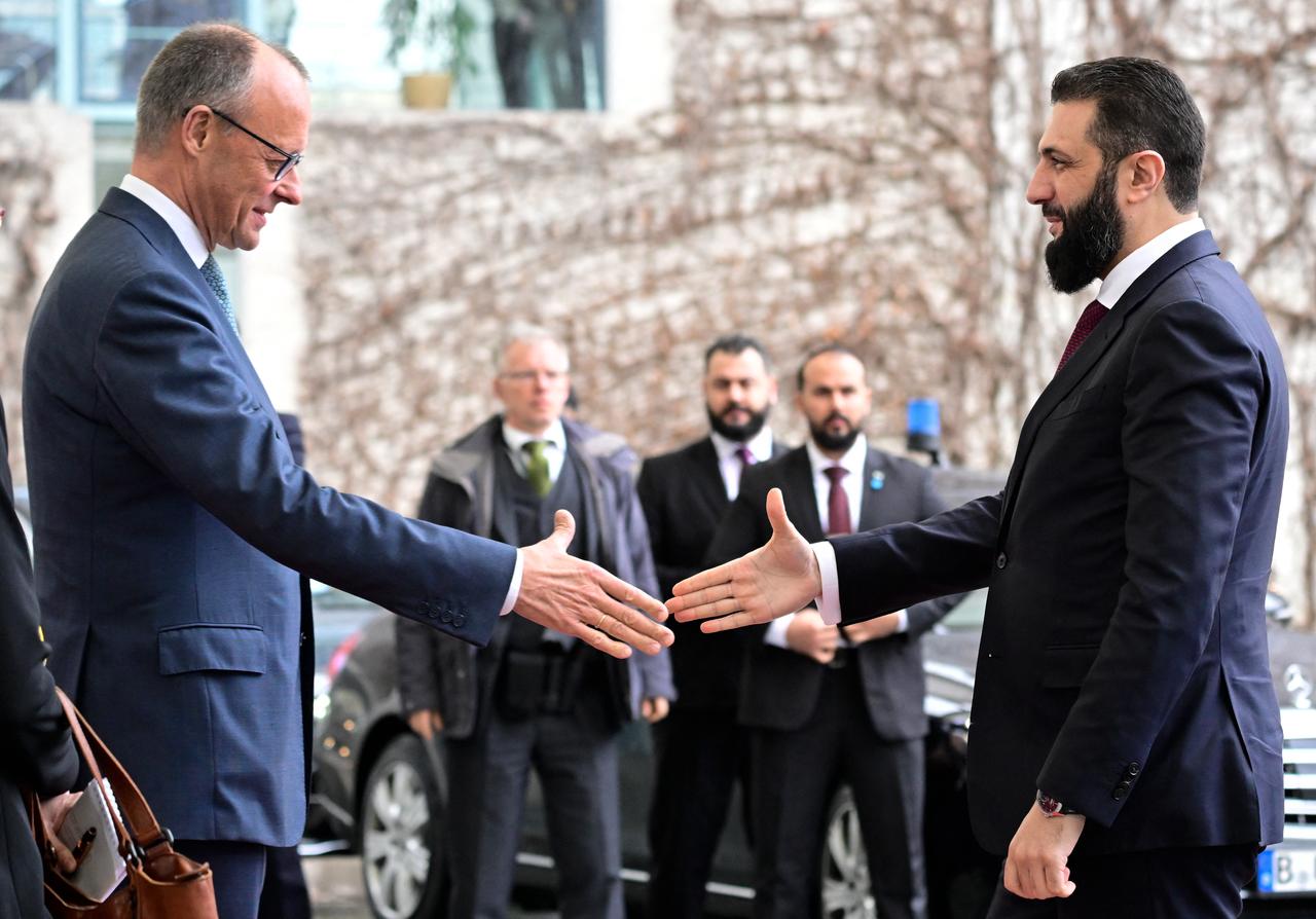 German Chancellor Friedrich Merz (L) welcomes Syrian President Ahmed al-Sharaa at the Chancellery in Berlin on March 30, 2026. (AFP photo)
