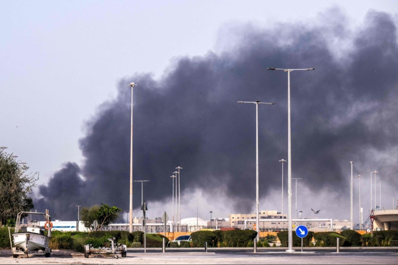 A plume of smoke rises from the Zayed Port following a reported Iranian strike in Abu Dhabi on March 1, 2026. (AFP Photo)