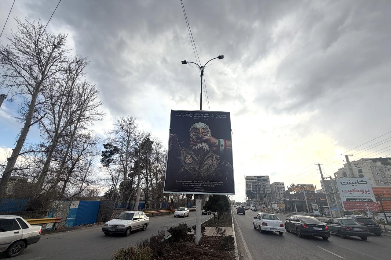 This picture, taken on March 31, 2026, shows an anti-US banner displayed in Tehran. (AFP Photo)