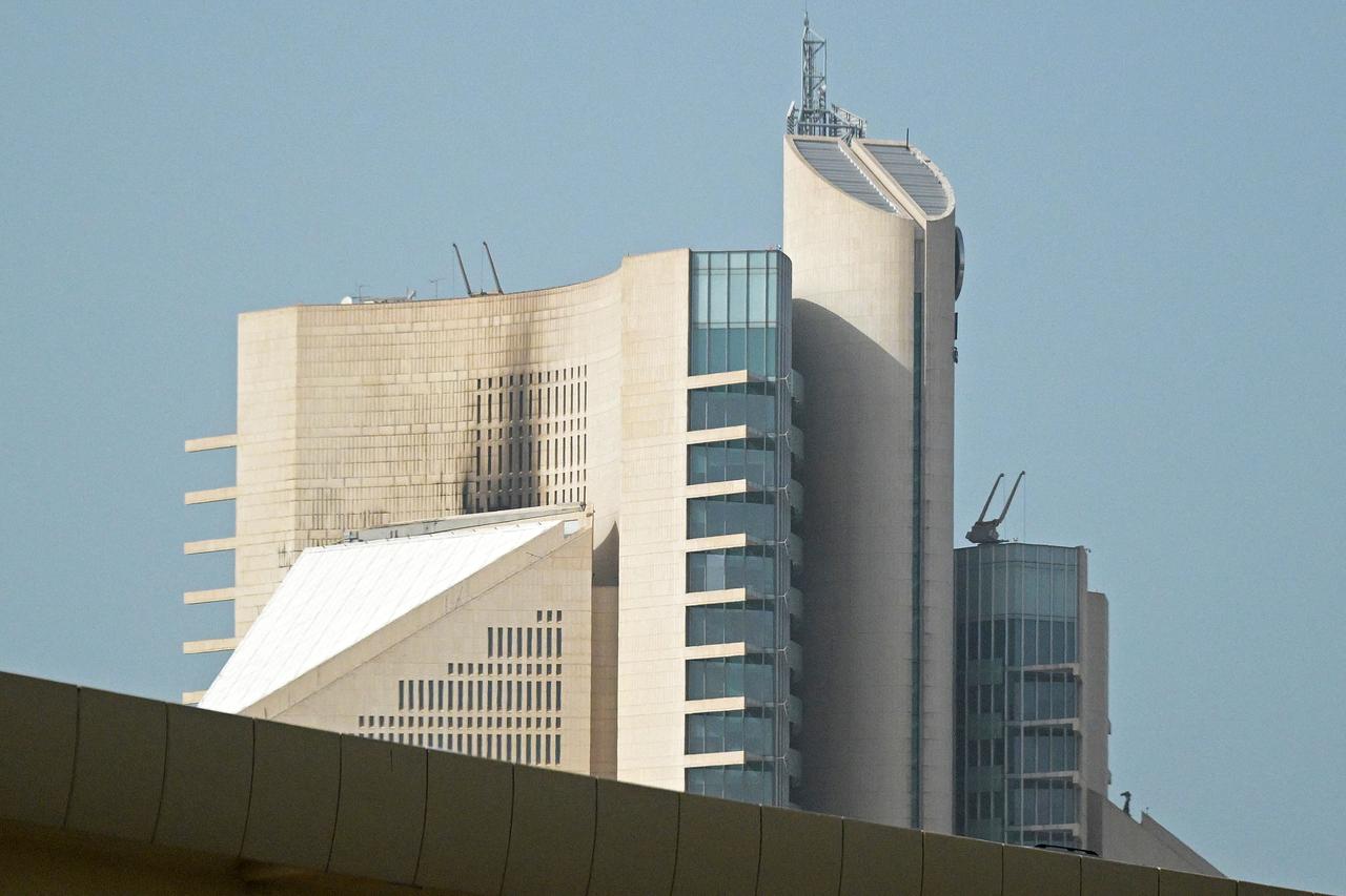 The impact of a fire caused by a drone attack on a building of the Kuwait Petroleum Corporation (KPC), in Kuwait City, April 5, 2026. (AFP Photo)