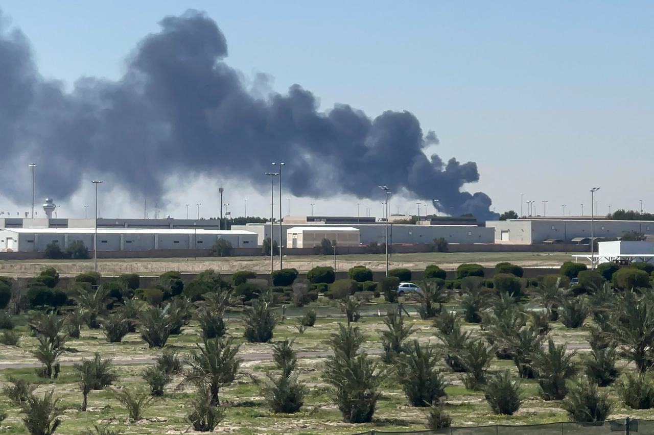 Smoke rises from an area of Kuwait's international airport after a reported drone strike on April 1, 2026. (AFP Photo)