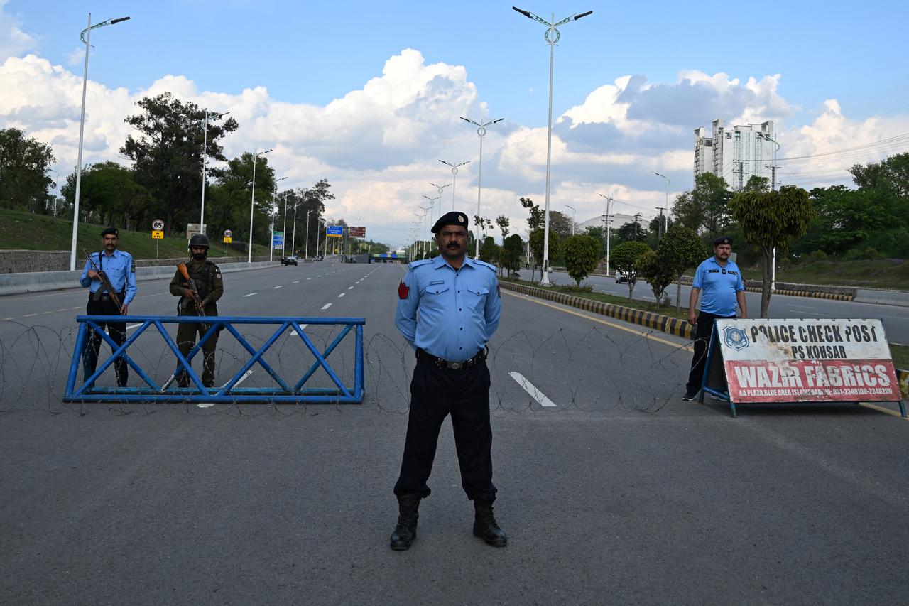 Security personnel stand guard on a closed road near Red Zone area in Islamabad, Pakistan on April 9, 2026. (AFP Photo)