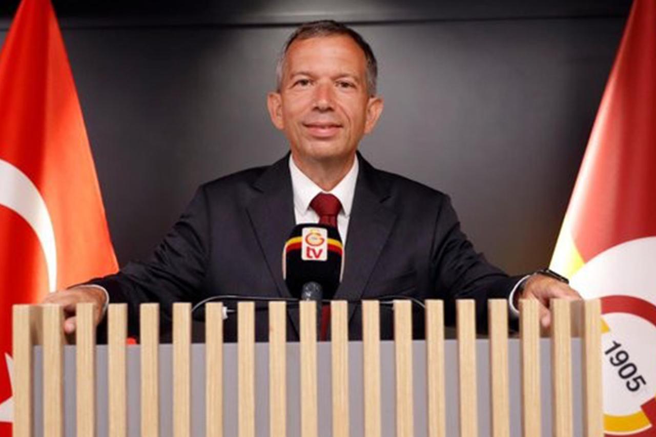 Remzi Sanver speaks at a podium at Galatasaray’s club facilities in Istanbul, Aug. 31, 2021. (IHA Photo)