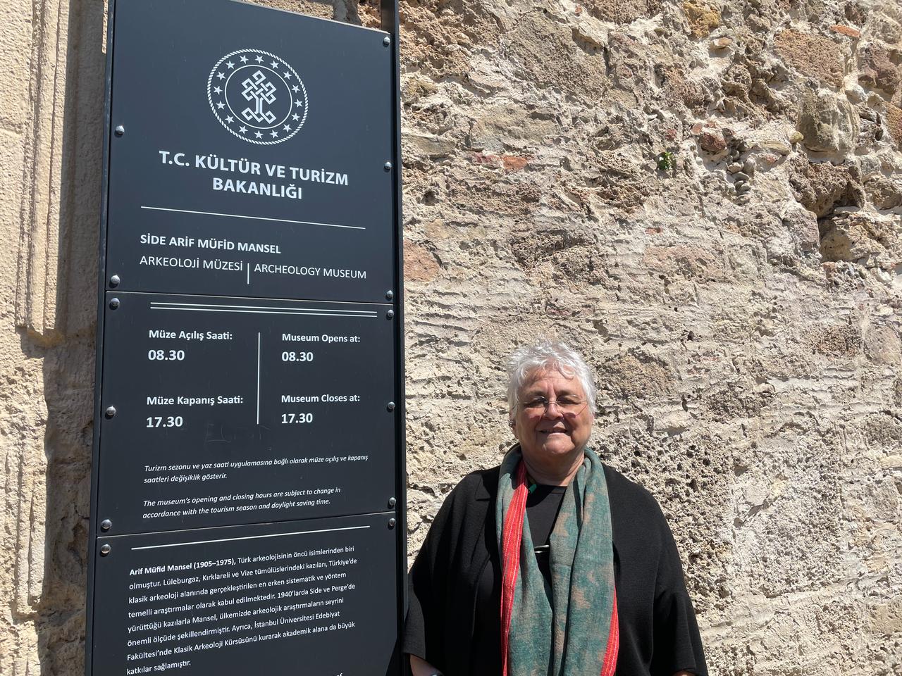 Professor Feristah Alanyali poses near the entrance of the Side Arif Mufid Mansel Archaeology Museum, Antalya, Türkiye, April 8, 2026. (Photo by Koray Erdogan/Türkiye Today)