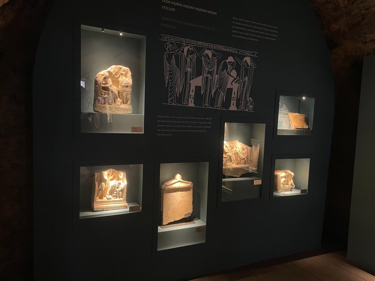 Grave steles and funerary reliefs on display inside the Side Arif Mufid Mansel Archaeology Museum, Antalya, Türkiye, April 8, 2026. (Photo by Koray Erdogan/Türkiye Today)