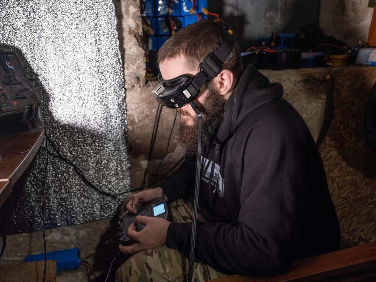 A handout picture taken and released on April 7, 2026, shows a Ukrainian serviceman operating an FPV-drone, in an undisclosed location in the Donetsk region. (Photo by Iryna Rybakova/93rd Kholodnyi Yar Separate Mechanized Brigade/AFP)