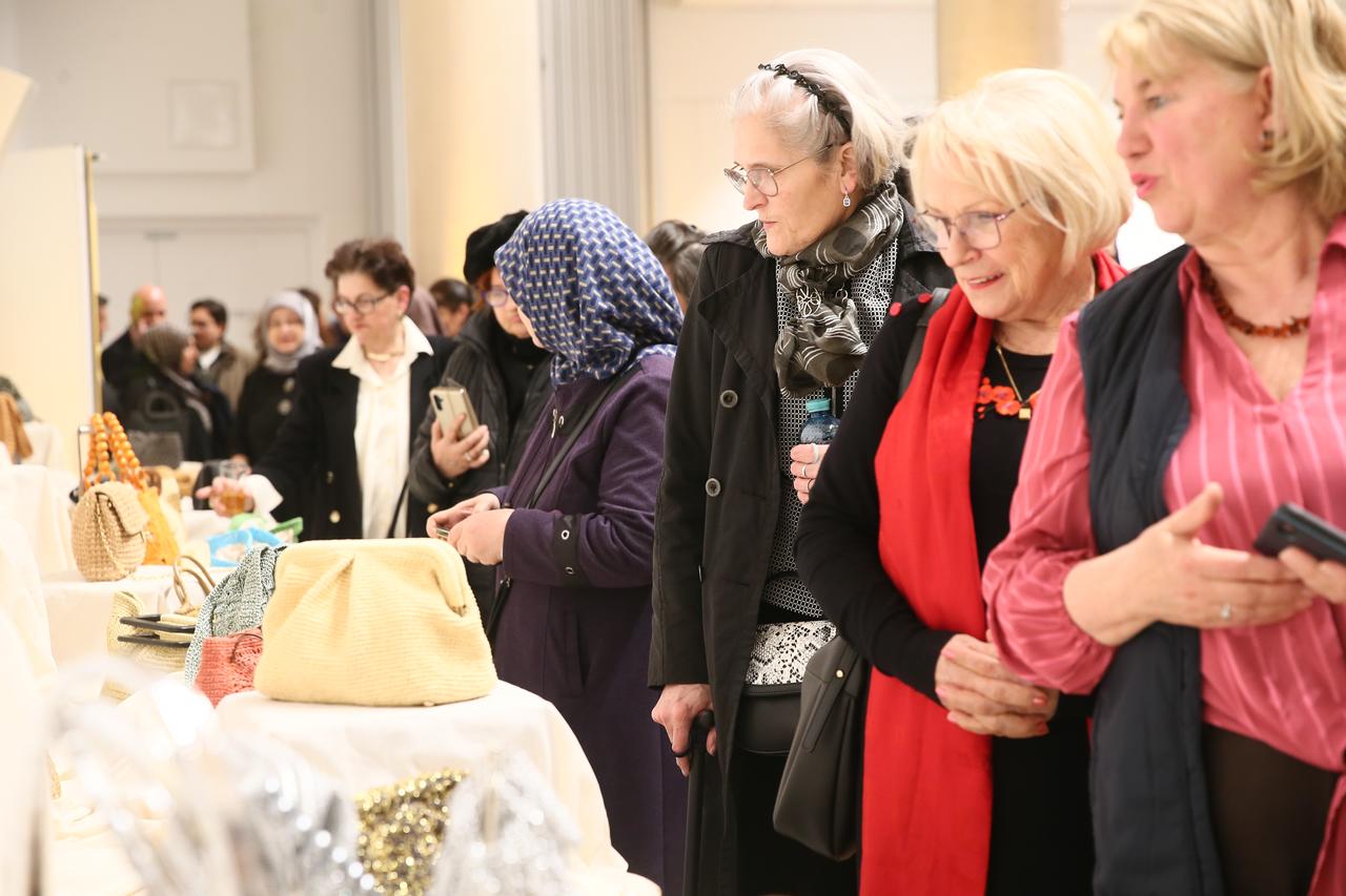 Visitors view handmade bags displayed at the Gobeklitepe-themed exhibition in Vienna, Austria. (AA Photo)