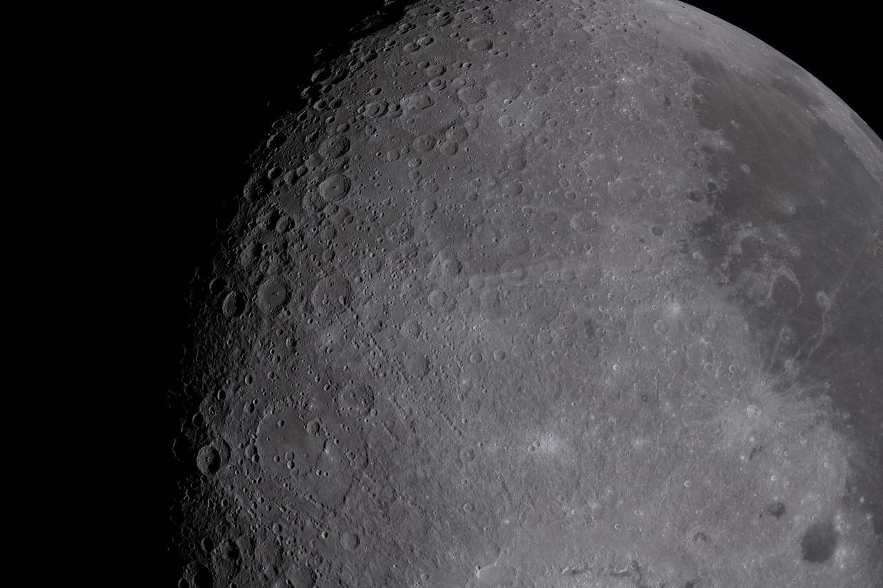 This handout picture released on April 8, 2026 by NASA, shows a view of the Moon, with multiple lunar landmarks such as Ohm crater, Oceanus Procellarum, Grimaldi crater, Pierazzo crater, the newly proposed Carroll crater and the expansive Hertzsprung Basin, photographed by the Artemis II crew from the Orion spacecraft on April 6, 2026.