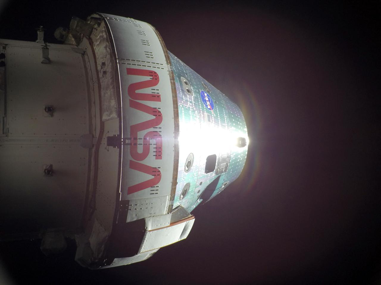 This handout picture released on April 8, 2026 by NASA, shows the Orion spacecraft on the sixth day into the Artemis II mission, photographed from one of the cameras mounted on its solar array wings, on April 7, 2026.
