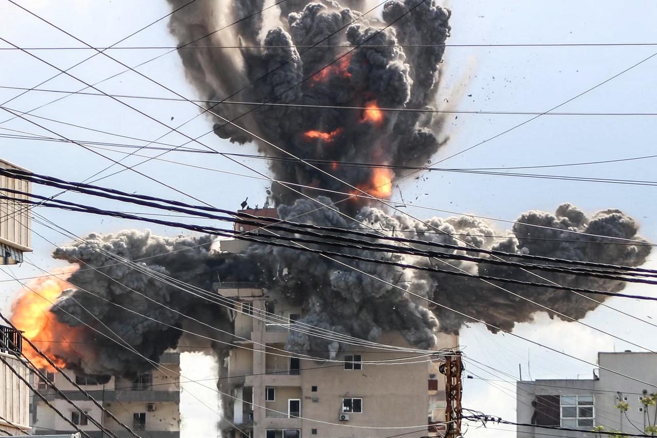 A fireball rises from a building hit by an Israeli airstrike in the area of Abbasiyeh, on the outskirts of the southern Lebanese city of Tyre, April 8, 2026. (AFP Photo)