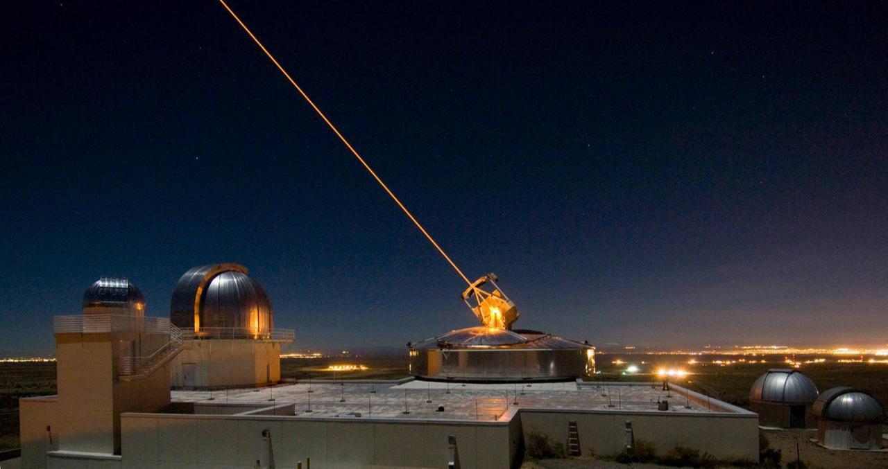 AFRL’s 3.5 meter telescope on Kirtland AFB, N.M. uses its laser to produce a guide star for a reference for adaptive optics, and previously held the record for the smallest telescope to image an asteroid’s satellite.  (Photo via US Air Force)