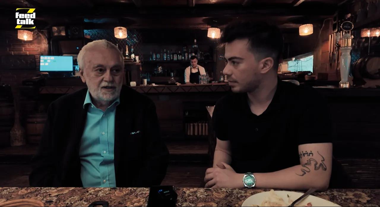 Sports commentator Omer Urundul speaks with Dogukan Altas during filming in Kosovo. (Photo via FeedTalkz video)