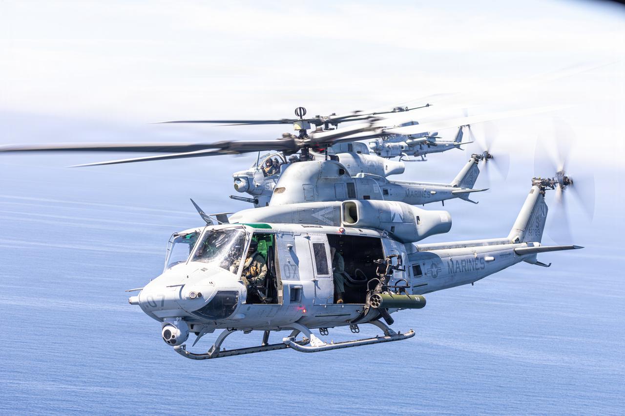 U.S. Marine Corps UH-1Y Venom and AH-1Z Viper helicopters perform a mixed-section flyover for the San Diego Padres 2026 Season Opening Day Game at Petco Park, San Diego, March 26, 2026. (Photo via U.S. Marine Corps)