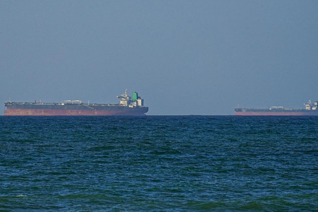 A view of the vessels passing through Strait of Hormuz following the two-week temporary ceasefire reached between the United States and Iran on the condition that the strait be reopened, seen in Oman on April 08, 2026. (AA Photo)