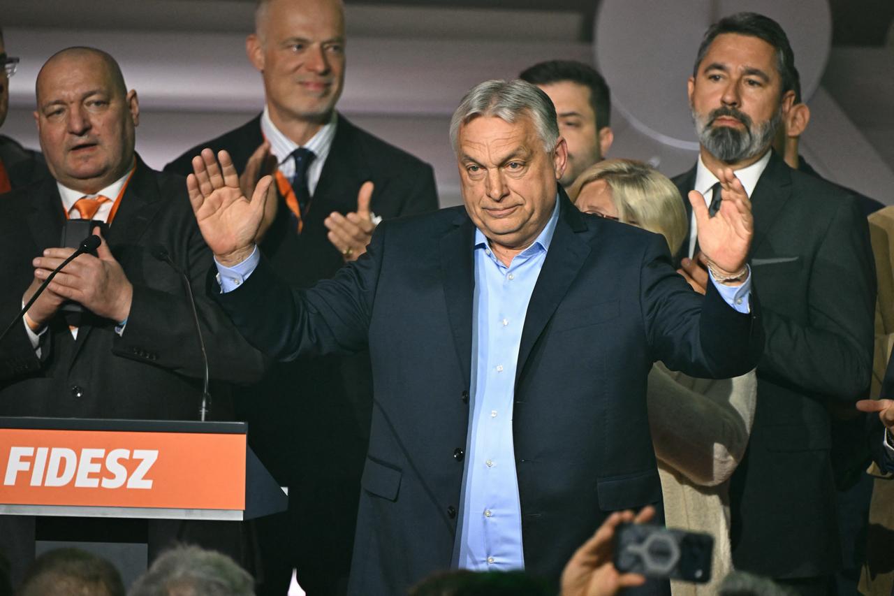 Hungary's Prime Minister Viktor Orban salutes to supporters at the Balna centre in Budapest during a general election in Hungary, on April 12, 2026. (AFP Photo)