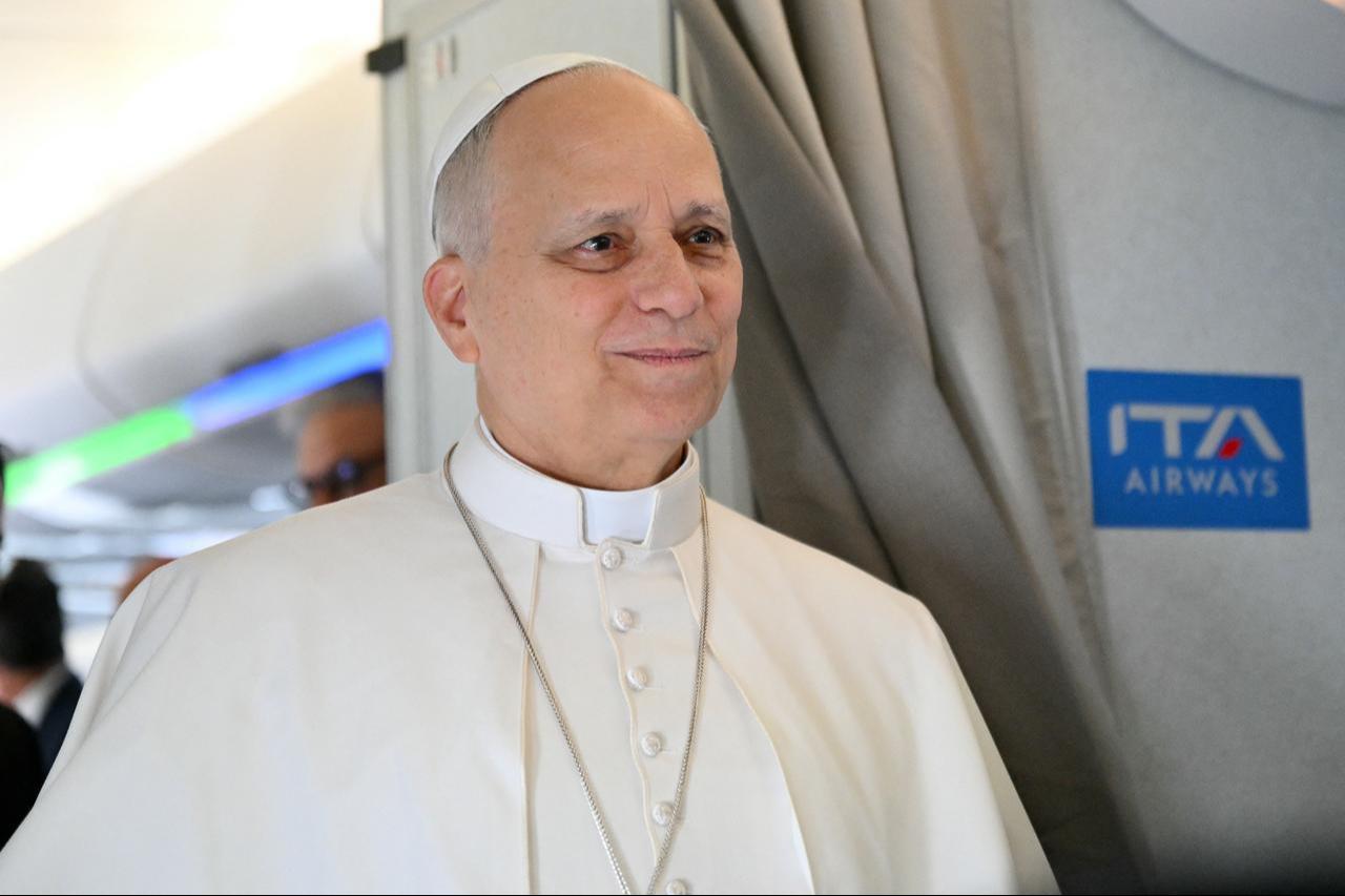 Pope Leo XIV addresses journalists during the flight heading to Algiers, Algeria on April 13, 2026. (AFP Photo)