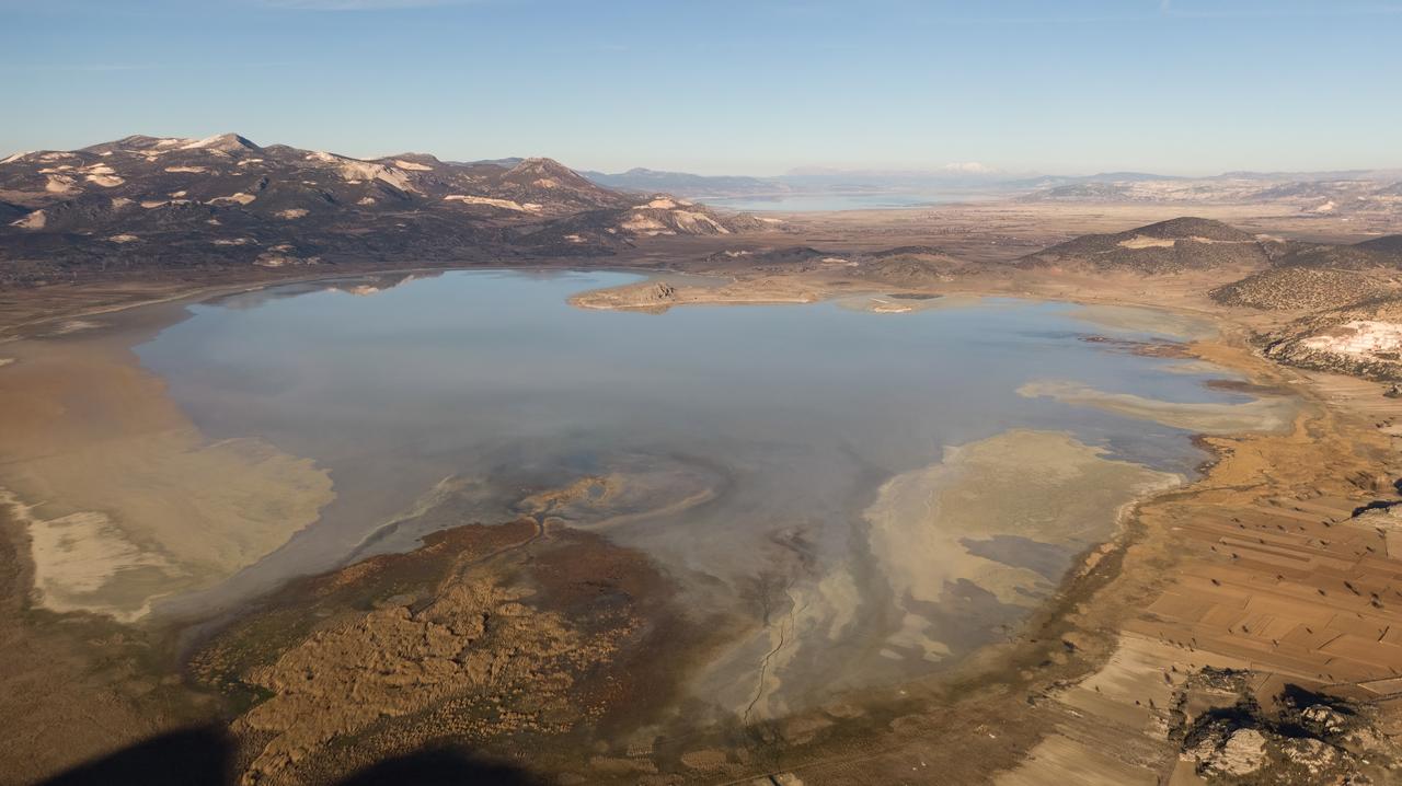 An aerial view shows receding water and cracked soil at Lake Yarışlı amid drought conditions in Türkiye in an undated Adobe Stock photo. (Adobe Stock Photo)
