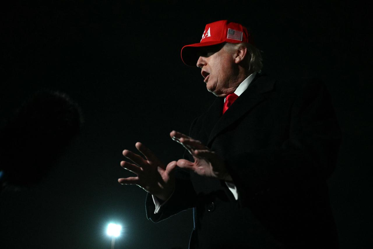 US President Donald Trump speaks to the press upon arrival at Joint Base Andrews in Maryland on April 12, 2026. (AFP Photo)