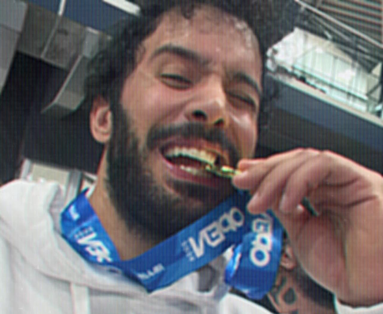 Baris Arduc bites his gold medal following his victory at the Milan International Open-IBJJF Jiu-Jitsu Championship in Milan, Italy, April 2026. (Photo via Instagram/@arducbrs)