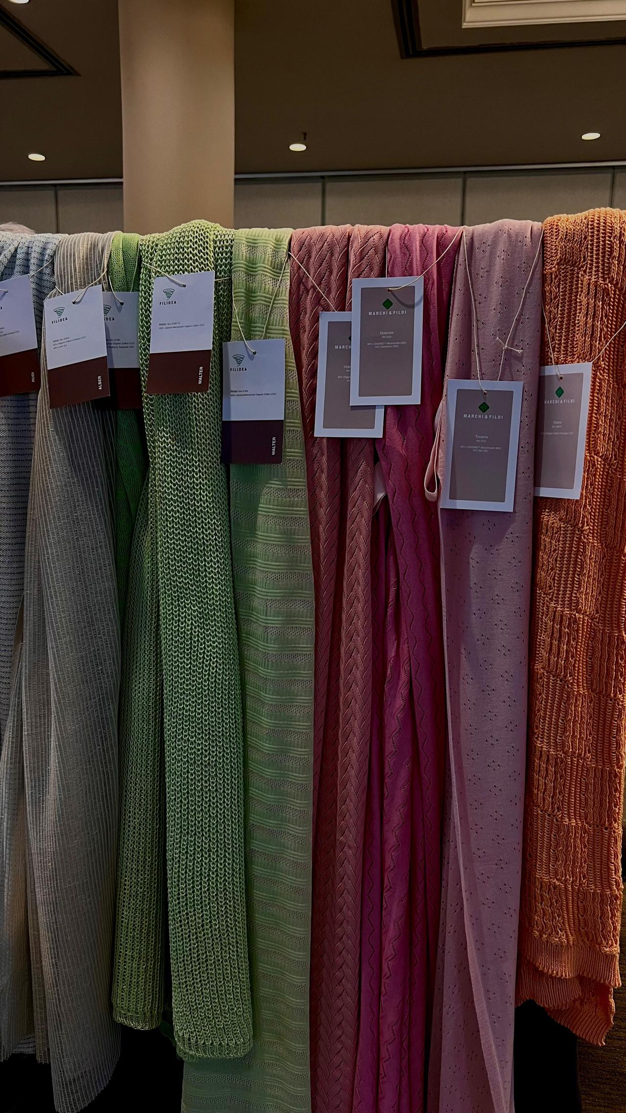 A collection of Italian yarn in soft, light tones hangs on display at the Istanbul event. (photo by Türkiyetoday)