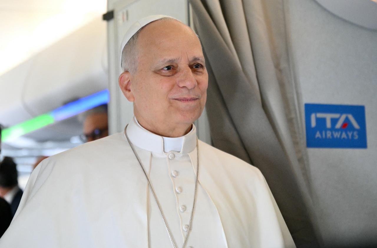 Pope Leo XIV addresses journalists during the flight heading to Algiers, Algeria on April 13, 2026. (AFP Photo)