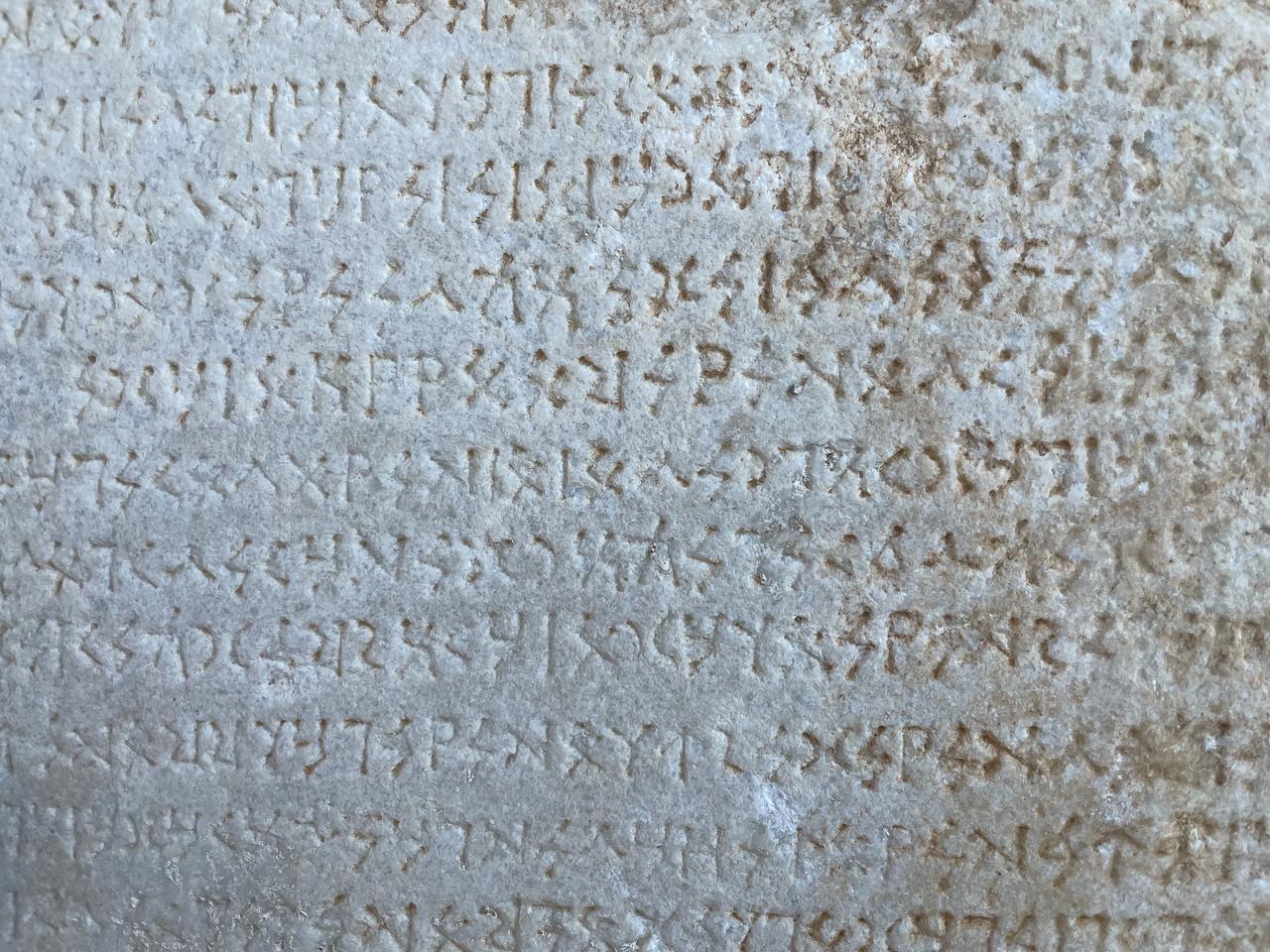 Close-up of Sidetic script engraved on stone, offering insight into one of Anatolia’s rare languages, Antalya, Türkiye, April 8, 2026. (Photo by Koray Erdogan/Türkiye Today)