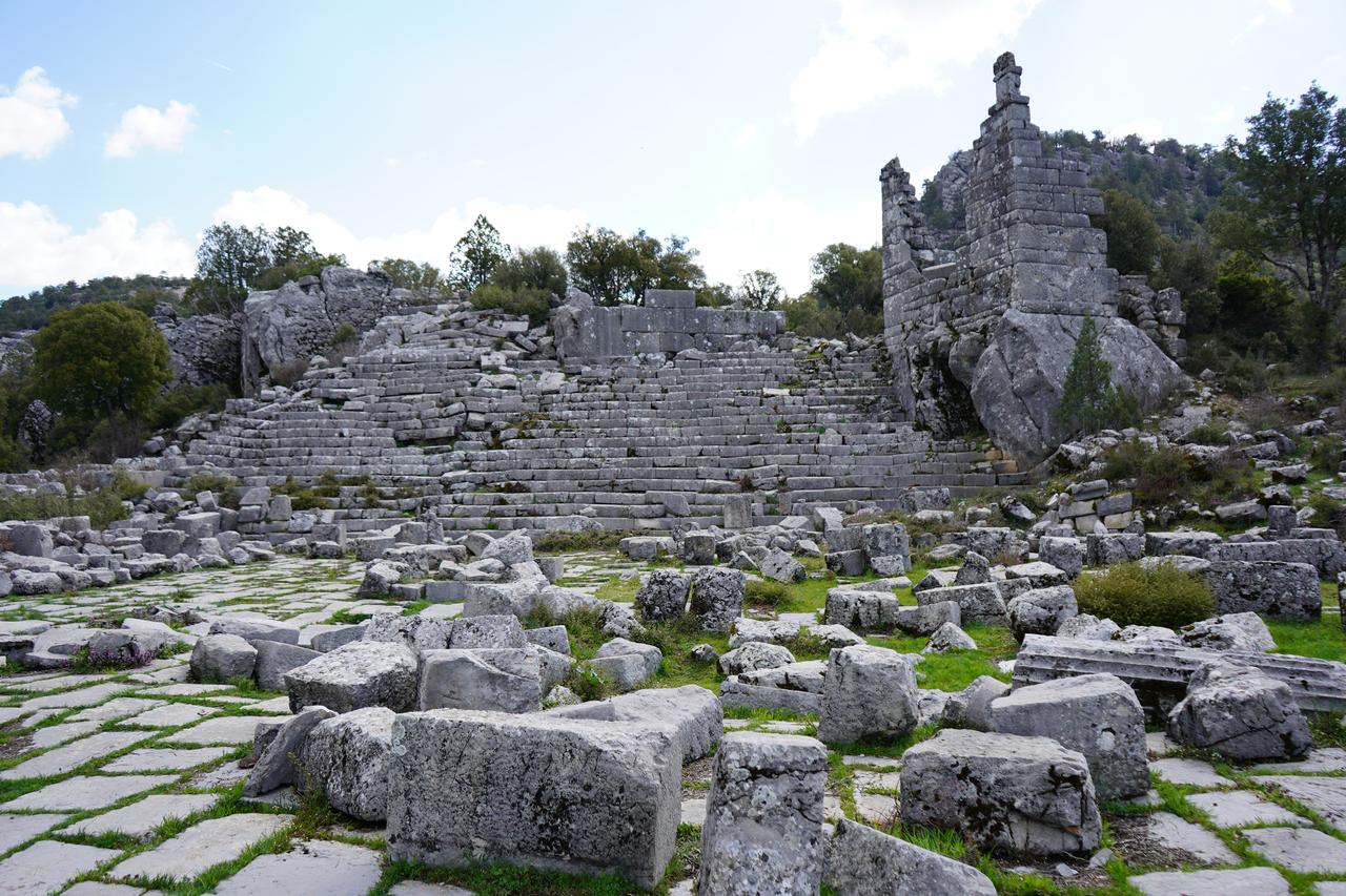 Ancient stone seating rows and structural remains are seen at the ancient city of Adada, where ongoing archaeological excavations reveal a continuous settlement and advanced administrative structure spanning 17 centuries in Sutculer district of Isparta, Türkiye, April 9, 2026. (AA Photo)