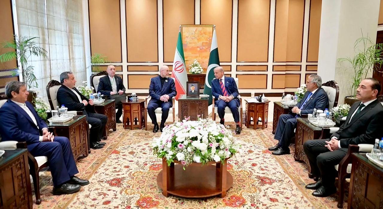 This handout photograph taken on April 11, 2026 shows Pakistan's Army Chief and Field Marshal Syed Asim Munir (R), FM Ishaq Dar (2R), PM Shehbaz Sharif (3R) during their meeting with Iranian officials prior to the US-Iran peace talks in Islamabad. (Photo by Pakistan Prime Minister's Office/AFP)