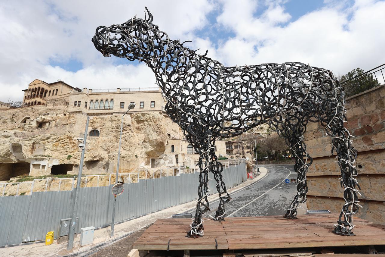 A horse sculpture made of metal horseshoes stands outside the Erhan Ayata Beautiful Horses Museum in Urgup, Cappadocia, Türkiye, April 15, 2026. (AA Photo)