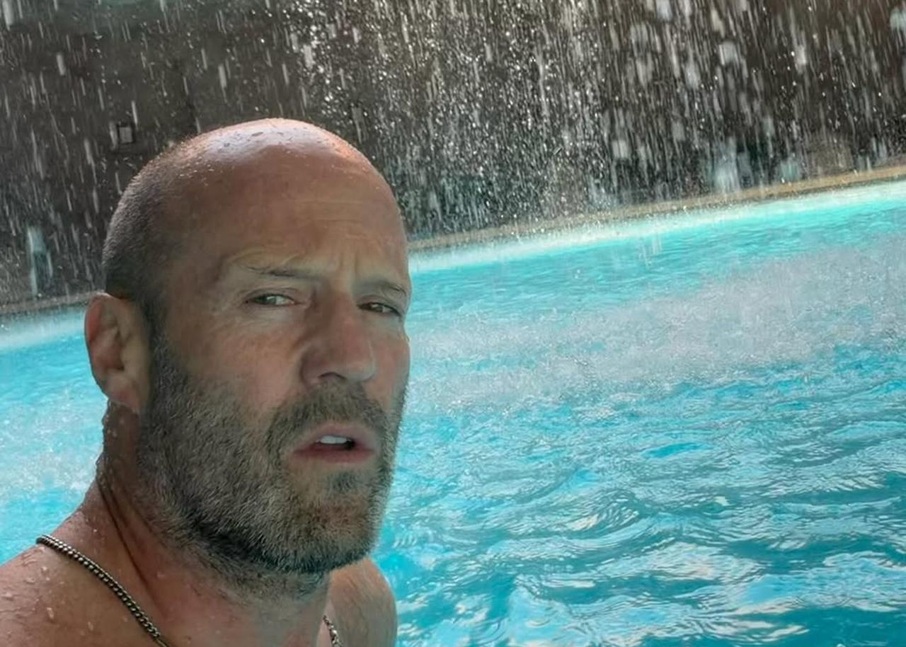Jason Statham takes a selfie beneath a cascading waterfall at a resort in Antalya, Türkiye, April 15, 2026. (Photo via Instagram/@jasonstatham)