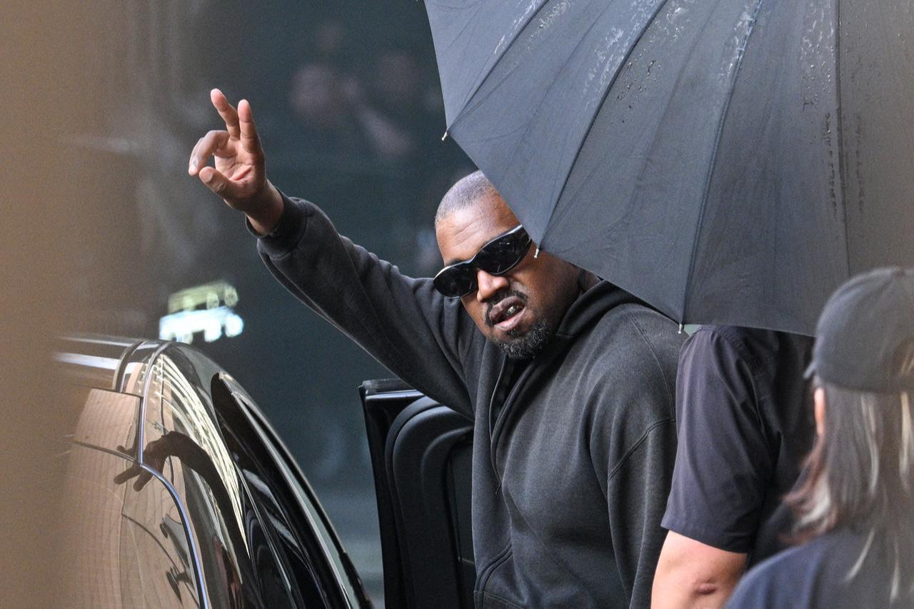 Kanye West gestures upon arriving at Shanghai Pudong International Airport in Shanghai, China, July 11, 2025. (AFP Photo)